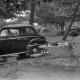 Archiv der Region Hannover, ARH NL Dierssen 1246/0023, Frau an einem Campingtisch sitzend, Steinhude?