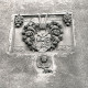 ARH NL Kageler 2588, Wappen und Engelskopf über dem westlichen Eingang der Johannes-der-Täufer-Kirche, Wettbergen