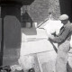 Archiv der Region Hannover, ARH NL Koberg 5836, Person beim Arbeiten an der zerstörten Marktkirche, Hannover