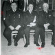 ARH Slg. Bartling 1251, Gruppenbild mit sechs verdienten Feuerwehrwehrmännern in Uniform aus Borstel, drei stehend, drei sitzend
