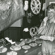 Stadtarchiv Neustadt a. Rbge., ARH Slg. Bartling 2410, Junge Frau beim Probieren der Brotsorten, die auf einer Anrichte stehen auf der Brot-Ausstellung der Bäckerinnung, Neustadt a. Rbge.