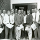 Stadtarchiv Neustadt a. Rbge., ARH Slg. Bartling 3567, Überreichung von Diplomen an mehrere Bauern durch den Kreis-Landvolkvorsitzenden Friedrich Rode (r.), Gruppenbild, Neustadt a. Rbge.