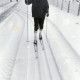 Stadtarchiv Neustadt a. Rbge., ARH Slg. Bartling 4074, Friedrich Duensing vom Ski-Club Eilvese auf Langlaufskiern in der Loipe des frisch gefallenen Schnees, Eilvese