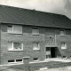 Stadtarchiv Neustadt a. Rbge., ARH Slg. Bartling 4093, Neubau eines Mehrfamilienhauses durch die Firma Duensing, Eilvese