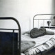 Archiv der Region Hannover, ARH Slg. Janthor 0284, Bett in einem Zimmer in der Kaserne, Hannover?