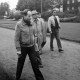 Archiv der Region Hannover, ARH Slg. Weber 02-051/0016, V.l. stellv. Stadtdirektor Peter Schnabel, Harmonie-Vorsitzender Friedrich Kirchhoff, Bürgermeister Helmut Oberheide und Kultursamtsleiter Wilfried Filipiak aus Gehrden auf dem Vorplatz des Holstentors, Lübeck